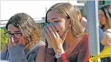  ?? JOHN MCCALL/SOUTH FLORIDA SUN-SENTINEL ?? Students are released from a lockdown following the shooting at Marjory Stoneman Douglas High School.