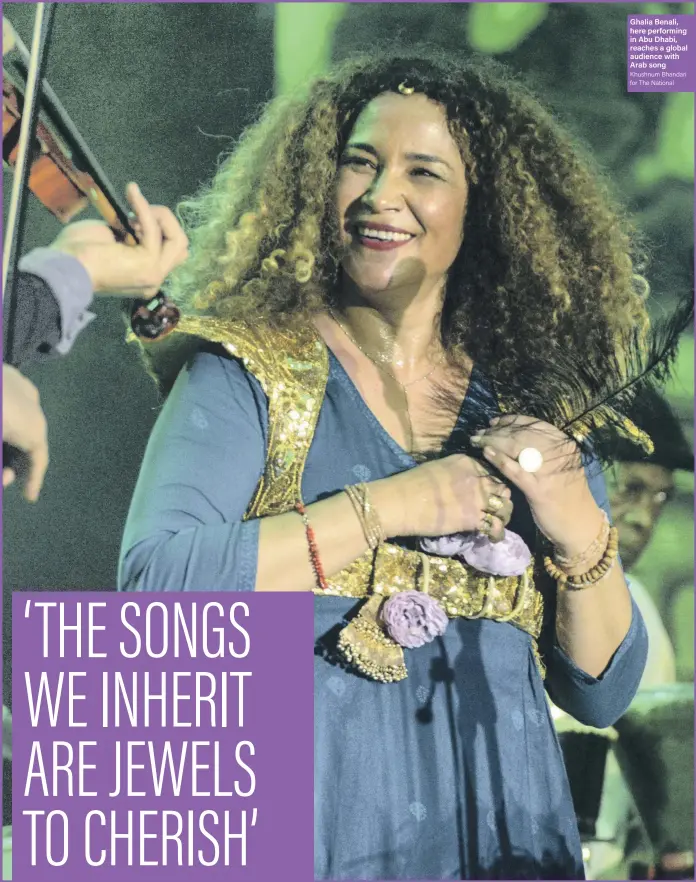  ?? Khushnum Bhandari for The National ?? Ghalia Benali, here performing in Abu Dhabi, reaches a global audience with Arab song