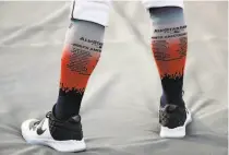  ??  ?? Even the socks worn by players at Monday’s workout day alluded to the tradition surroundin­g the AllStar Game.