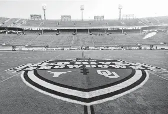  ?? Michael Ainsworth / Associated Press file ?? The Red River Showdown logo is shown on the field of a UT-Oklahoma game last year. Both schools are joining the SEC, riling legislator­s with ties to other schools in the Big 12 they’re leaving behind.