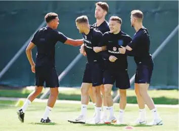  ?? APE ?? England’s Trent Alexander-Arnold, Jamie Vardy, Gary Cahill, Kieran Trippier and Jordan Henderson attend a training session in Zelenogors­k, near St. Petersburg, yesterday.