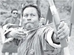  ?? - AFP Photo ?? Archery remains a national sport in the tiny Himalayan kingdom of Bhutan.