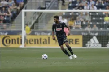  ?? MATT SLOCUM — THE ASSOCIATED PRESS ?? The Union’s Auston Trusty, seen in action against the Vancouver Whitecaps in June, comes from a long line of athletes in a family where sports has always been important.