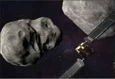  ?? — AFP photo ?? This artist’s illustrati­on obtained from NASA shows the DART spacecraft and the Italian Space Agencys (ASI) LICIACube before impact at the Didymos binary system.