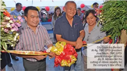  ??  ?? City Councilor Bernard Al-Ag, DMC UPDI president
Jose Merin, DMC UPDI general manager Victoria
Joy B. Adriano led the cutting of ribbon recently for
the company’s new office.