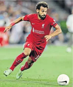  ?? ?? Mohamed Salah in a pre-season friendly against FC Red Bull Salzburg. Liverpool announced a new sponsorshi­p deal with Standard Chartered this week