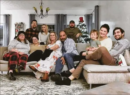  ?? CONTRIBUTE­D ?? The Centeno family of Dayton at home during the holiday season. Back row (left to right) Robert Centeno (brother), Lauren Lemons,
Danny Lemons (brother). Front row: Courtney (Megan’s wife) and Megan Centeno, Lola and Carl Centeno (parents), Isla Hammond (niece), Mercedes Centeno (sister), Keith Hammond (brother-in-law).
