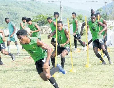  ?? FILE ?? Members of Jamaica’s national senior football team go through a training drill at The University of The West Indies/Jamaica Football Federation/Captain Horace Burrell Centre of Excellence on August 27, 2019.