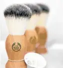  ?? BALINT PORNECZI/ BLOOMBERG NEWS PHOTO ?? Body Shop shaving brushes are part of a grooming line geared toward men.