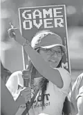  ??  ?? Amanda Blackhorse, a Navajo activist, leads a protests against the Washington Redskins Sunday, Oct. 12, 2014 outside the University of Phoenix Stadium in Glendale. Blackhorse was the lead plaintiff in the suit against the NFL Washington Redskins team.