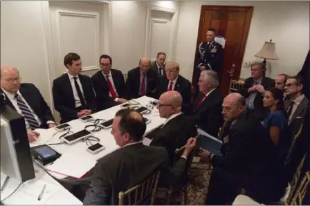  ?? THE ASSOCIATED PRESS ?? President Donald Trump receives a briefing on the U.S. military strike on Syria from his national security team at Mar-a-Lago in Palm Beach, Fla., on Thursday night.