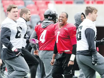  ?? JEAN LEVAC/ OTTAWA CITIZEN ?? Henry Burris of the Ottawa Redblacks, like many other players, was all smiles during practice at TD Place on Wednesday. Ottawa will host the Hamilton Tiger-Cats in the East Division final on Sunday. Kickoff is at 1 p.m.