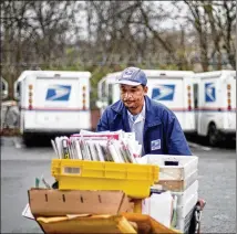  ?? ASSOCIATED PRESS 2013 ?? A task force will study the United States Postal Service under an executive order signed Thursday by the president. He said that the USPS is on “an unsustaina­ble financial path.”