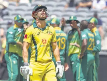  ?? AFP ?? Australia's Chris Lynn (C) walks off after being dismissed during the first ODI versus South Africa in Perth on Saturday.