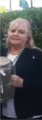  ??  ?? Left: Dolores O’Riordan’s mother Eileen with the Liam MacCarthy Cup at her home. Photo: Limerick Leader. Right: Dolores O’Riordan, who died last January