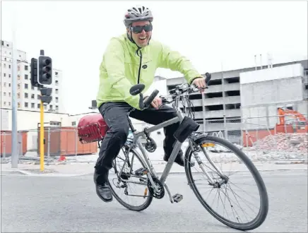  ?? Photo: DONSCOTT/FAIRFAX ?? All dressed up: Ewan Sargent shows off his almost beloved Sirrus bike.