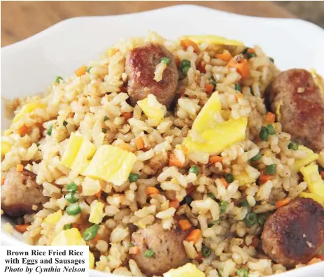  ?? Photo by Cynthia Nelson ?? Brown Rice Fried Rice with Eggs and Sausages