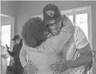  ?? PHOTO PROVIDED BY TYLER LACY ?? Jaguars defensive tackle Tyler Lacy gets a hug from his mother, Veronica, after the Jaguars drafted him.