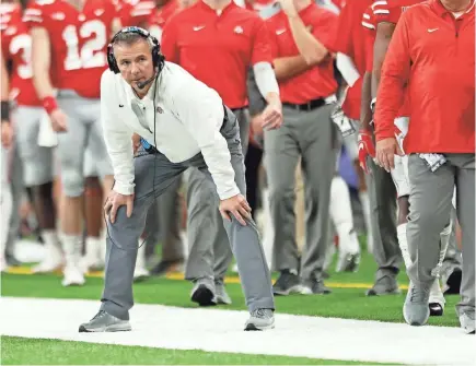  ?? BRIAN SPURLOCK/USA TODAY SPORTS ?? Urban Meyer, who has a 186-32 regular-season record and an 11-3 bowl record in 17 years coaching at Bowling Green, Utah, Florida and Ohio State, is set to coach his last game with the Buckeyes in his first Rose Bowl.