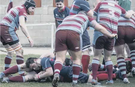  ??  ?? Horden and Peterlee (claret and blue) concede the first try to James Sant of South Shields Westoe in Saturday’s 33-16 home defeat.