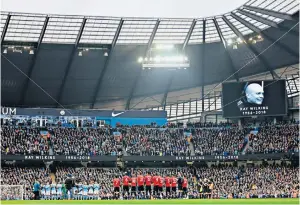  ??  ?? Perfect tribute: A minute’s applause is observed for the former United midfielder and England captain Ray Wilkins, who died this week