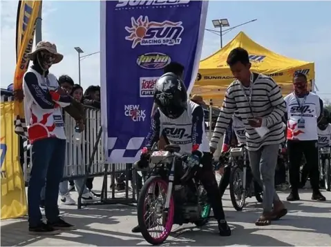  ?? — Photo by BCDA ?? RACING
About 70 riders compete in the Sun Racing Cup Motorcycle Drag Racing in New Clark City on Saturday.
Gathering close to 1,000 enthusiast­s, the race celebrates Sun Racing Spirit Philippine­s’ 17th year, and marks its first-ever motorcycle drag race organized on the roads of New Clark City.