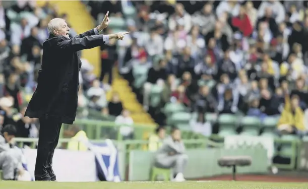  ?? PICTURE: JAMIE MACDONALD/GETTY IMAGES ?? 0 Walter Smith directs operations from the touchline during Scotland’s Euro 2008 qualifier against Faroe Islands at Hampden.