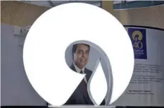  ??  ?? The logo of Reliance Industries is pictured in a stall at the Vibrant Gujarat Global Trade Show at Gandhinaga­r, India. — Reuters