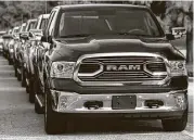  ??  ?? The Limited’s novel billet port grille breaks from the long tradition of crosshair styling with bold “RAM” lettering.