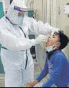  ??  ?? A patient’s sample being collected at the Dera Bassi civil hospital on Friday.