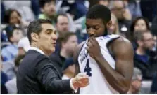  ?? KEITH SRAKOCIC — THE ASSOCIATED PRESS ?? Villanova head coach Jay Wright, left, talks with Eric Paschall during the second half of a second-round game in the NCAA men’s college basketball tournament against Alabama, Saturday.