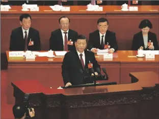  ?? ANDY WONG/AP ?? CHINESE PRESIDENT XI JINPING delivers a speech at the closing ceremony for China’s National People’s Congress (NPC) at the Great Hall of the People in Beijing on Monday.