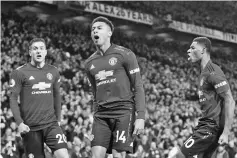  ??  ?? Manchester United’s Jesse Lingard celebrates his equaliser in a thrilling 2-2 draw with Arsenal. - AFP photo