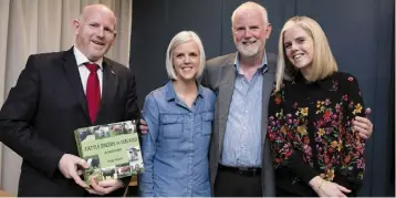  ??  ?? Greg Walsh with his son Dick (left) and daughters Gemma and Claire at the book launch