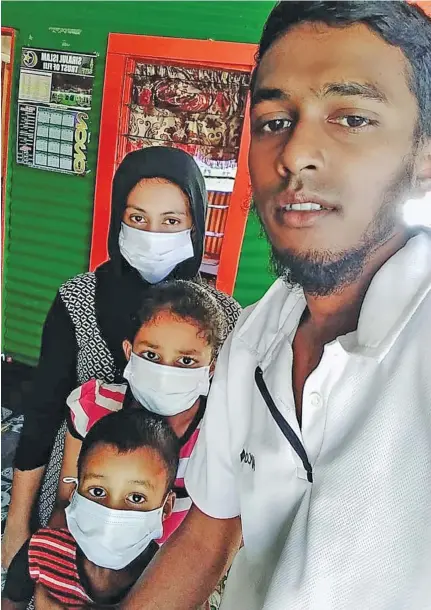  ??  ?? Mohammed Rizwan with his wife and children at their home in Soasoa, Labasa, on May 4, 2020.