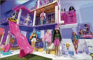  ?? RICHARD DREW/AP ?? A Barbie Dream House is displayed at the TTPM Holiday Showcase in New York. Toy makers are seeking containers to ship their goods while searching for alternativ­e routes and ports.