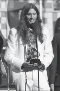  ?? The Associated Press ?? AWARDS: Ludwig Goransson, accepts the award for record of the year for "This Is America" at the 61st annual Grammy Awards on Sunday in Los Angeles.