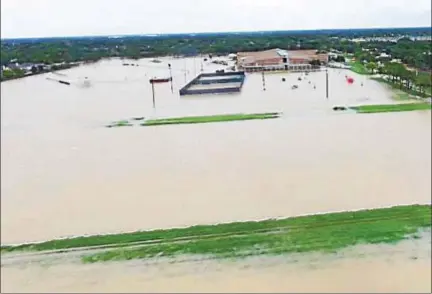  ?? PHOTO COURTESY OF BARBARA KOSCIEWICZ ?? This photo shows the flooding of Katy Junior High School in Texas, about 25 miles west of Houston, which has been devastated by floodwater­s.