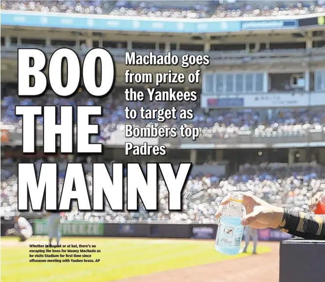  ?? AP ?? Whether in dugout or at bat, there’s no escaping the boos for Manny Machado as he visits Stadium for first time since offseason meeting with Yankee brass.