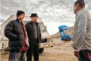  ?? FRITO-LAY VIA AP ?? Aaron Paul, Bryan Cranston and Raymond Cruz act in a scene from the PopCorners 2023 Super Bowl NFL football spot.