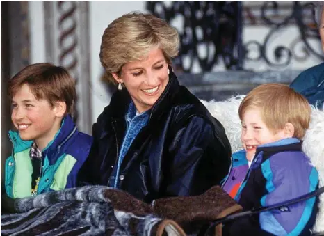  ?? PHOTO: TIM GRAHAM/GETTY IMAGES ?? Diana, Princess of Wales with sons Prince William and Prince Harry in Lech, Austria.