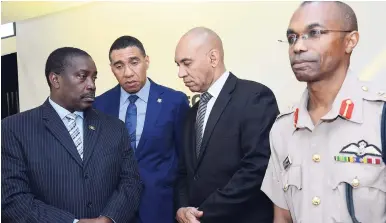  ?? FILE ?? The four men on whose shoulders Jamaica’s national security falls: (from left) National Security Minister Robert Montague; Prime Minister Andrew Holness; Commission­er of Police-designate Antony Anderson; and army chief, Major General Rocky Meade.