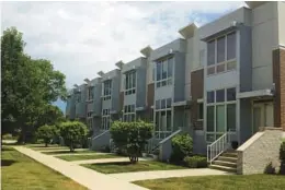  ?? KAREN BERKOWITZ/PIONEER PRESS ?? Hyacinth Place is a 14-unit affordable condominiu­m complex in Highland Park, constructe­d by Community Partners for Affordable Housing. Four of the units are rented and the others are owned.
