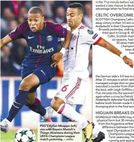  ?? AFPPIX ?? PSG’S Kylian Mbappe (left) vies with Bayern Munich’s Thiago Alcantara during their UEFA Champions League match yesterday. –