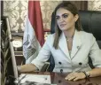  ?? — AFP ?? Egyptian Minister of Internatio­nal Cooperatio­n Sahar Nasr works at her office in Cairo.