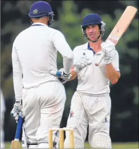  ?? Picture: Grant Melton FM4491134 Buy this picture from kentonline.co.uk ?? Matt White, left, talks to fellow opener Tom Harvey during The Mote’s reply against Holmesdale