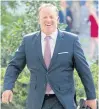  ??  ?? HAVING A LAUGH: Outgoing White House press secretary Sean Spicer walks outside the West Wing.