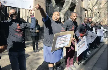  ?? PICTURE: NHLANHLA PHILLIPS ?? UNITED IN ACTION: Gauteng MEC for Community Safety, Sizakele Nkosi-Malobane, joins a group of men protesting in Joburg yesterday over women and child abuse.