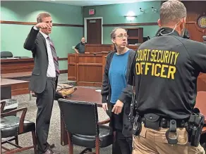  ?? QUINLAN BENTLEY/THE ENQUIRER ?? Michelle Bray, center, at the close of her trial in Kenton County Circuit Court on Tuesday.