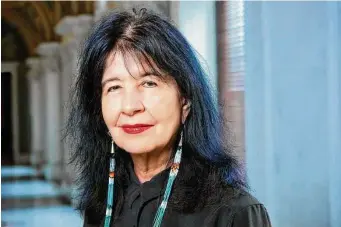  ?? Shawn Miller / Blue Flower Arts ?? U.S. Poet Laureate Joy Harjo’s new “Weaving Sundown in a Scarlet Light” contains a collection of poems that span a 50-year career.